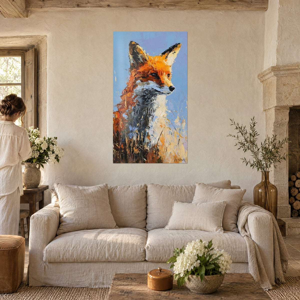 Wall art red fox with black ears on sky blue background, grey chest, above a sofa in a bright living room