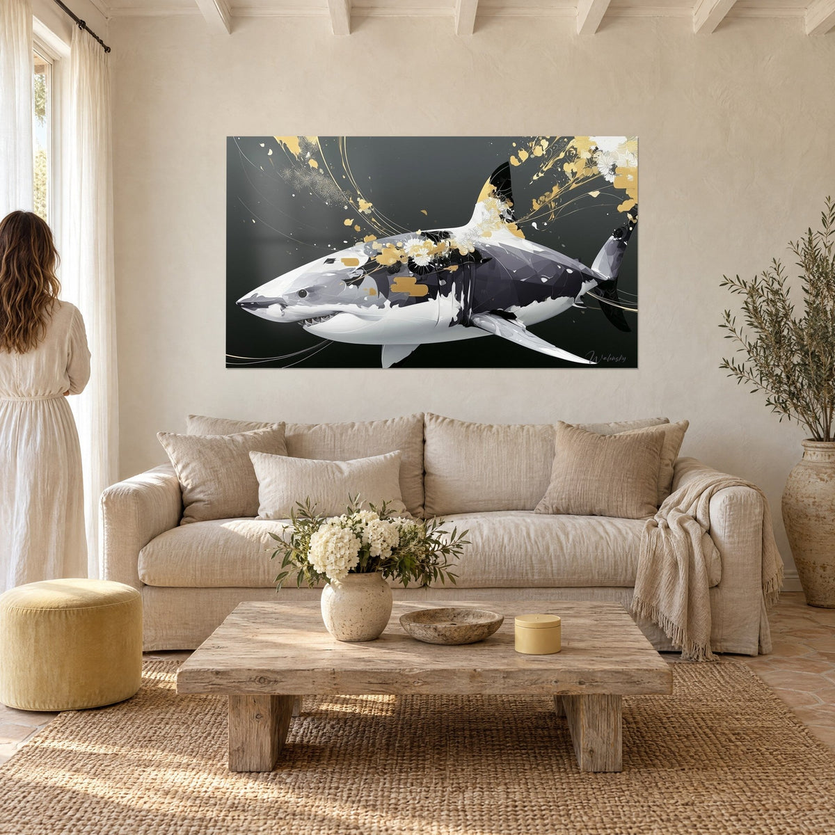 Wall art large great white shark flecked with gold, ivory belly and charcoal background, above a sofa in a bright living room