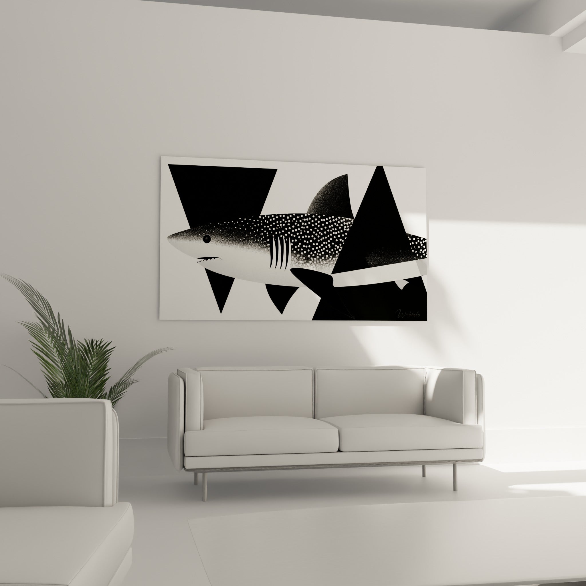 Requin stylisé aux nageoires noires et corps pointillé blanc accroché au-dessus d'un canapé dans un salon lumineux