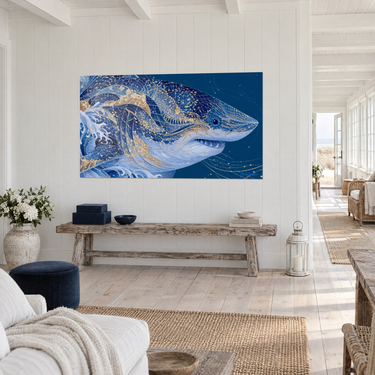 Wall art ornamental shark with filigree gold and midnight blue scales, white wave on the left, above a raw wood console