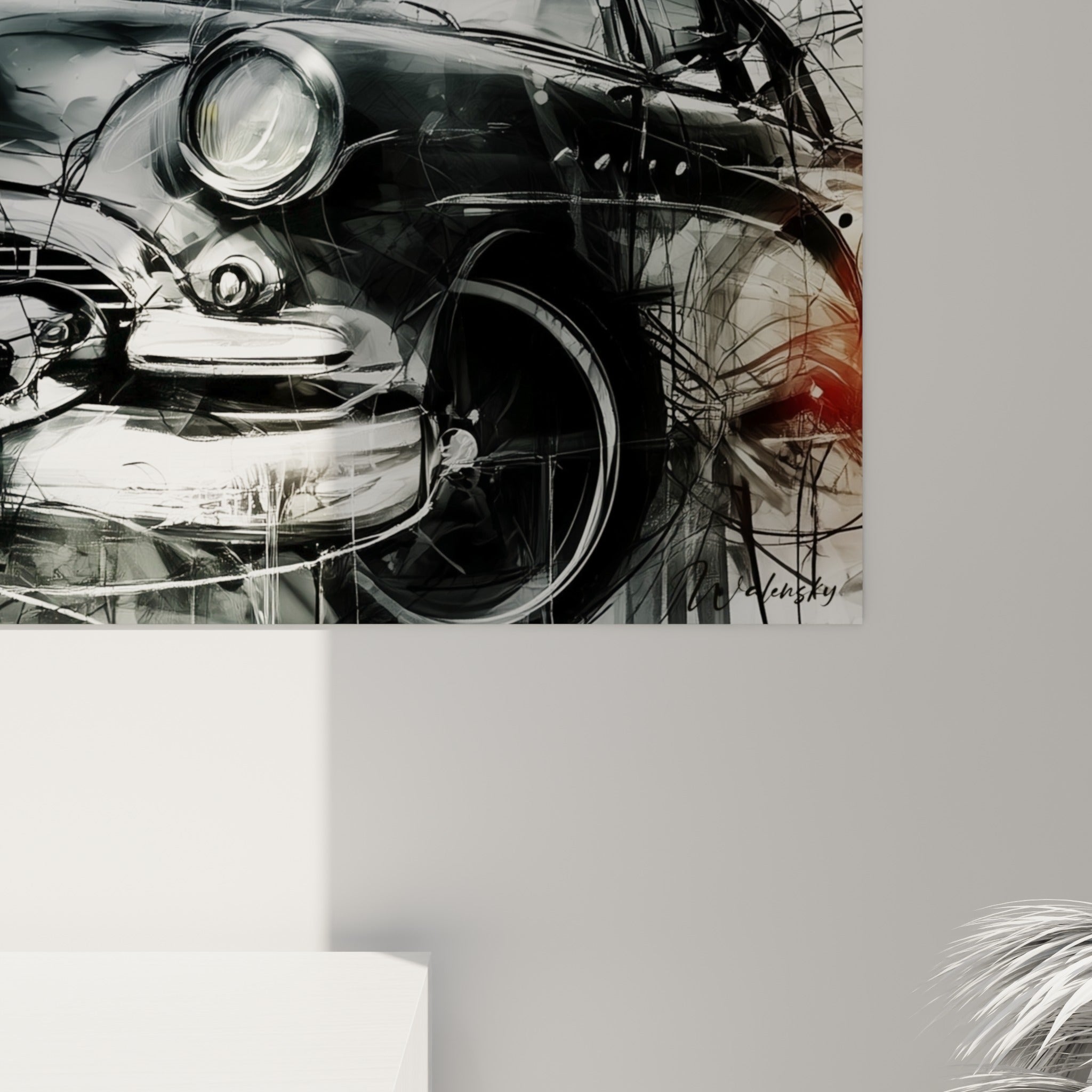 Détail de la calandre chromée noire et grise avec coulures d'encre et touche rouge orangé visible sur la toile