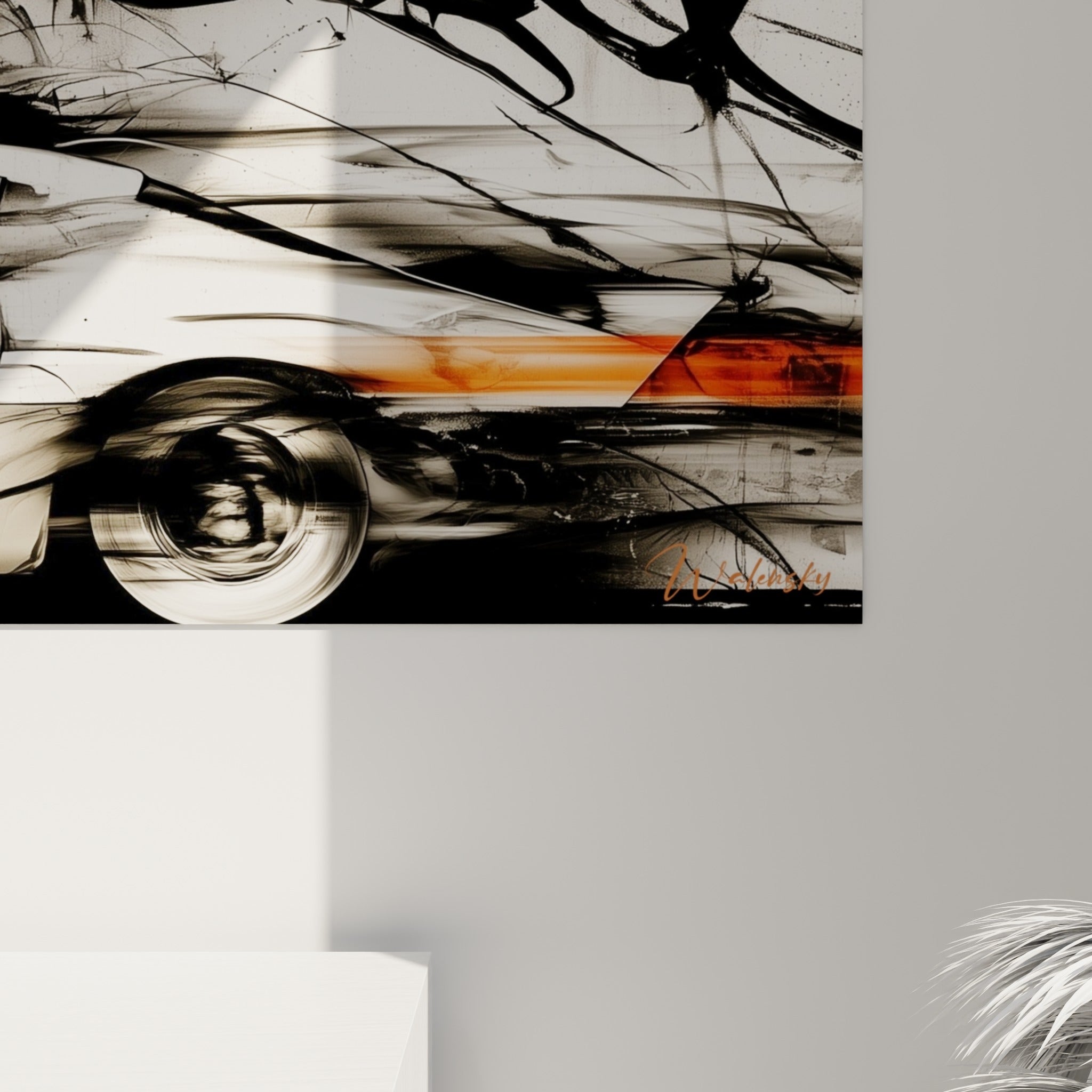 Détail des empâtements noirs et de la traînée orange sur la carrosserie blanche du bolide
