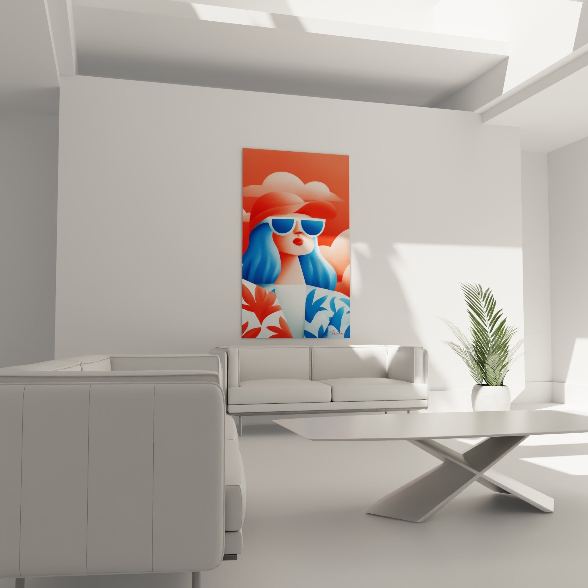 Portrait graphique aux tons corail et bleu marine, au-dessus d'un canapé dans un salon lumineux