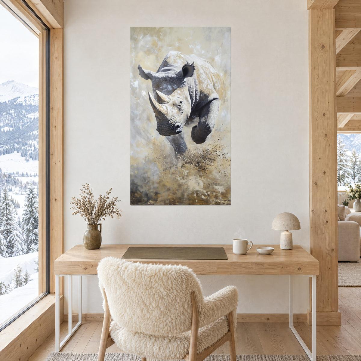 Quadro rinoceronte con due corna color crema, schizzi marroni su fondo sabbia e grigio perla, sulla parete di uno studio in legno chiaro