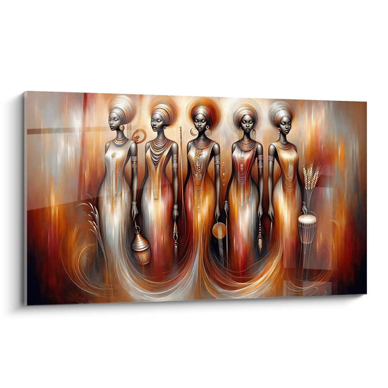 Il quadro africano visto di lato, i suoi colori dorati e bronzei catturano la luce. Le silhouette femminili, eleganti e maestose, illustrano la bellezza delle tradizioni ancestrali africane.

