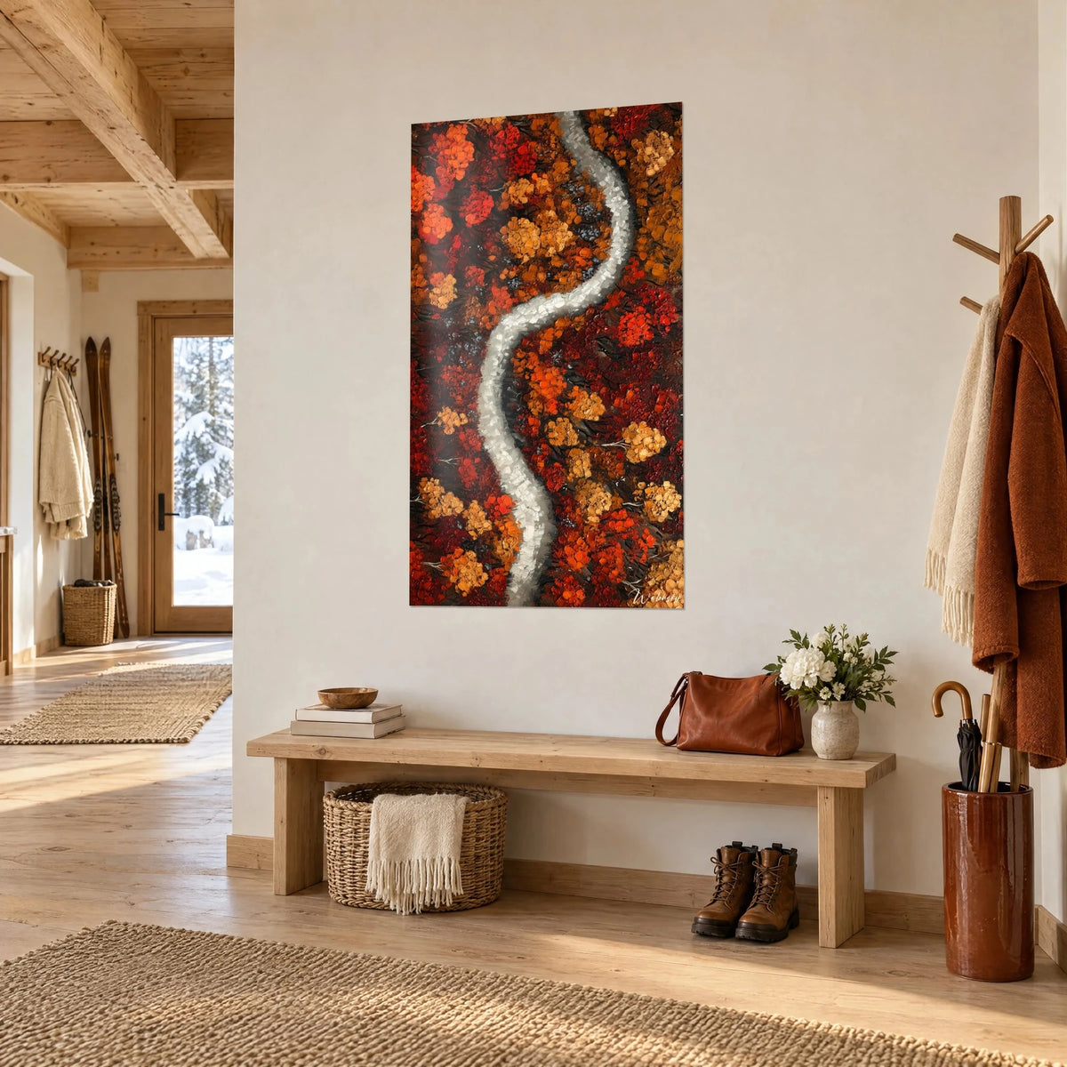 Quadro veduta aerea di un nastro grigio perla che zigzaga in una foresta ramata e cremisi, ingresso di uno chalet di legno