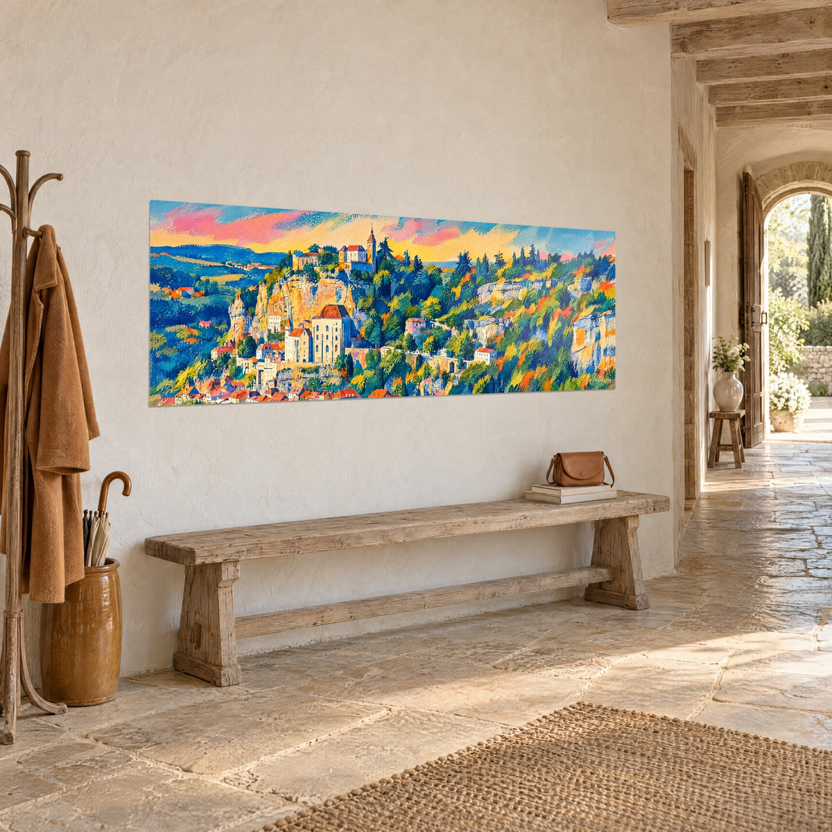 Toitures terracotta et ciel rosé de Rocamadour, tableau au-dessus d'un canapé dans un salon lumineux