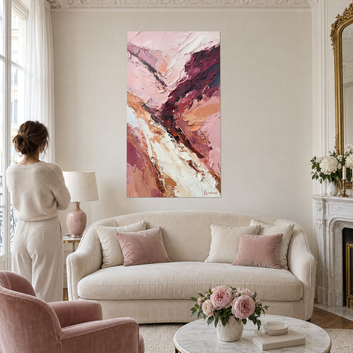 Wall art Abstract canvas with powder pink and burgundy impasto, diagonal ivory stroke, hanging above a sofa in a bright living room