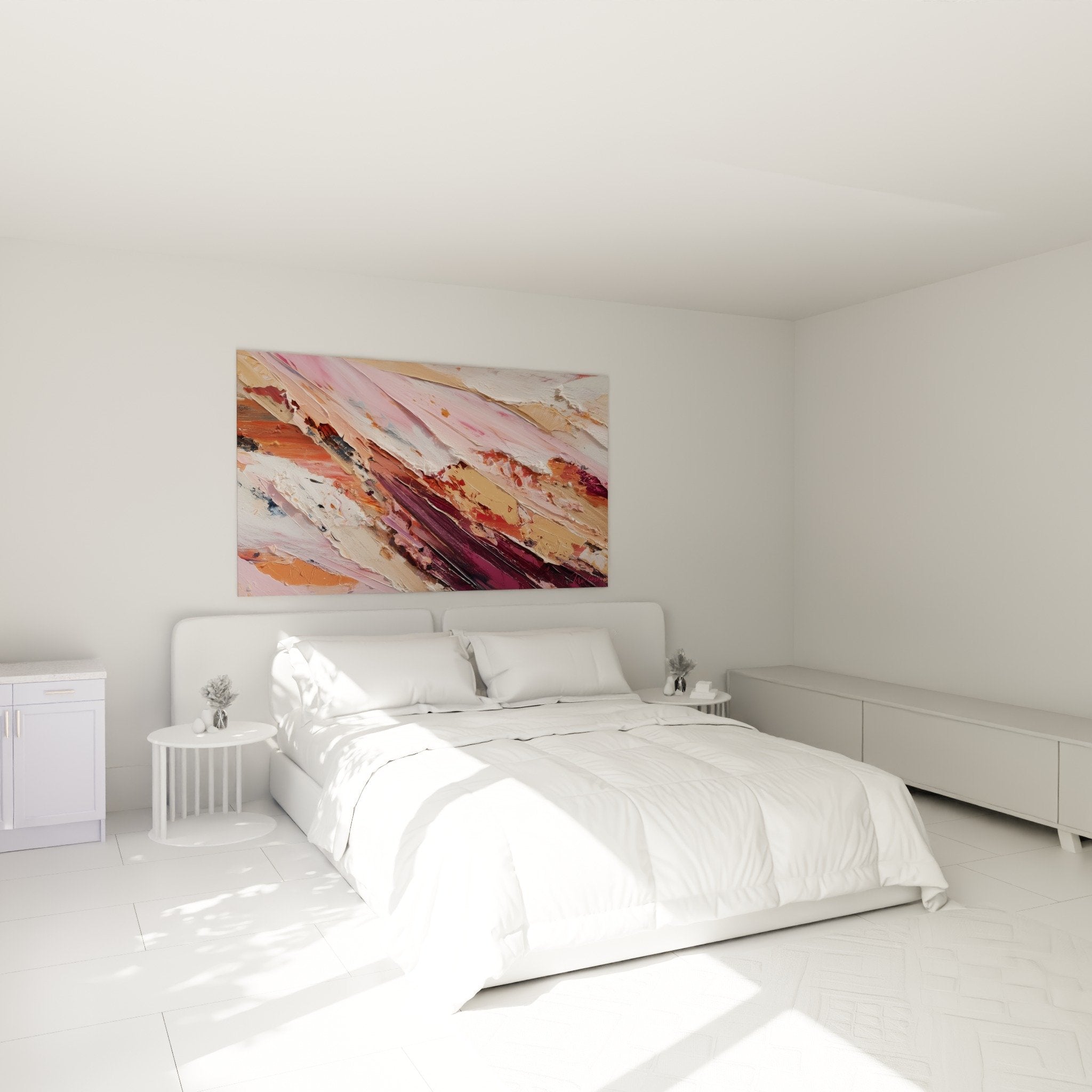 Œuvre abstraite rose et terre installée au-dessus d'un lit dans chambre moderne feng shui sud-ouest