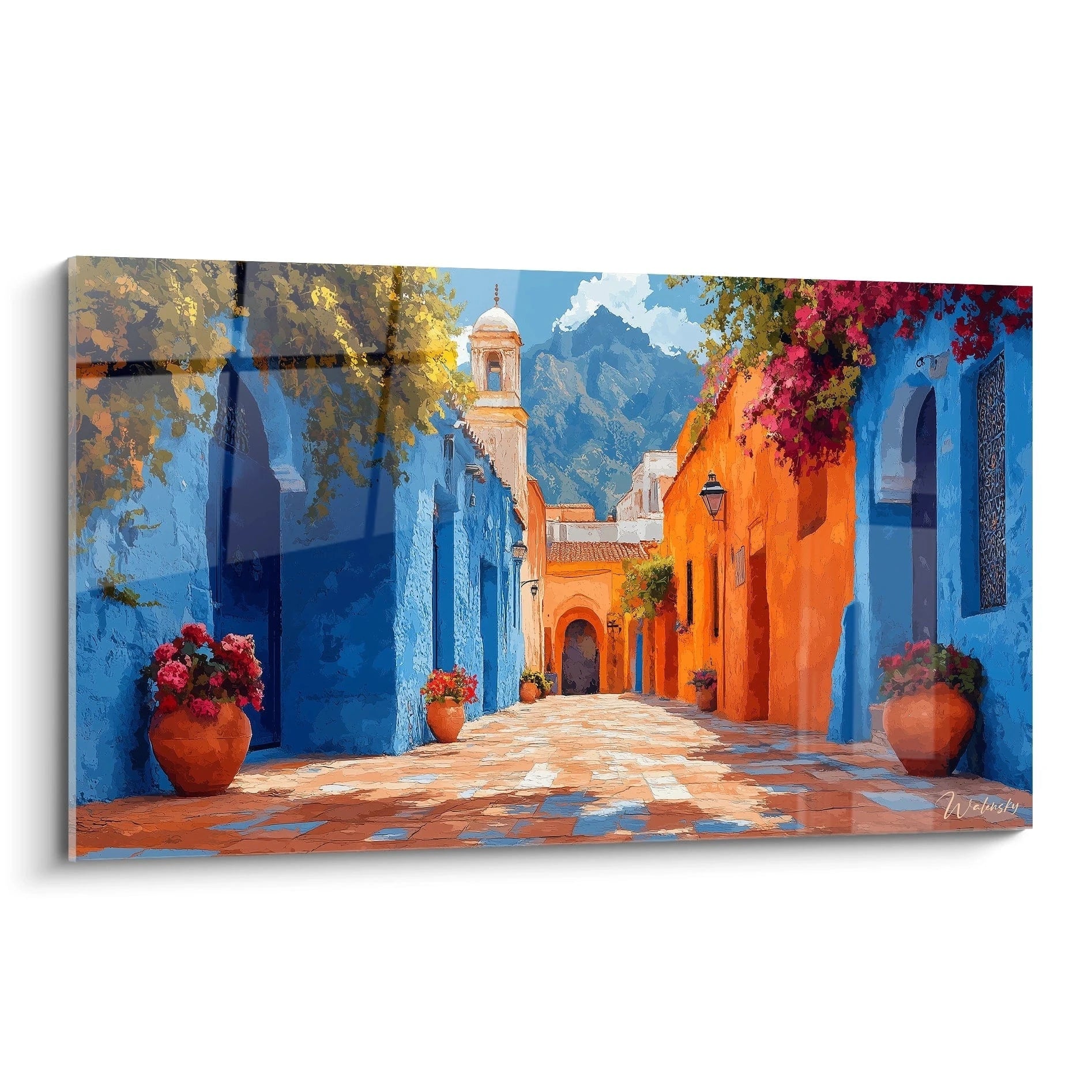 Un tableau artistique représentant une ruelle méditerranéenne aux murs bleu intense contrastant avec des façades orange, ornée de pots de fleurs rouges et de plantes grimpantes, menant vers un clocher blanc et des montagnes en arrière-plan.
