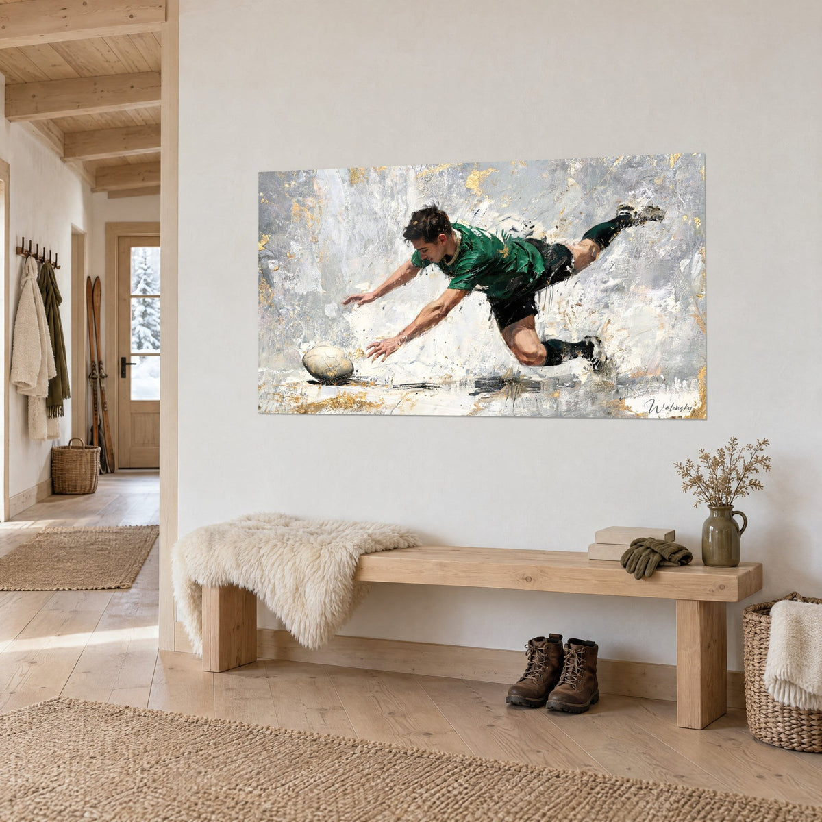 Wall art slender player in black shorts, arms stretched toward the try, grey and gold brushstrokes, light wooden entrance of a chalet