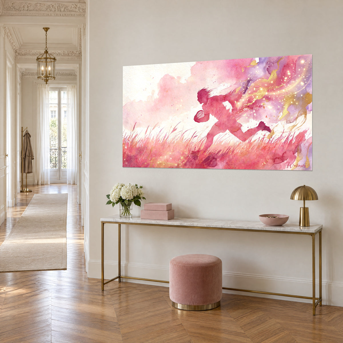 Tableau silhouette de joueur fuseau rose et or, herbes carmin, nuage lilas, accroché au-dessus d'une console dorée, vue de trois-quarts