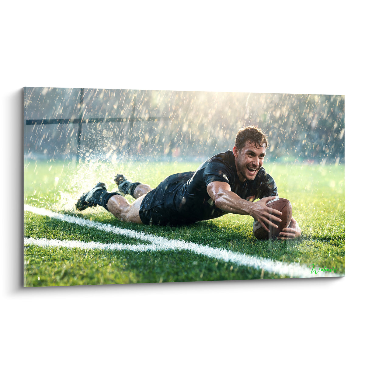Joueur de rugby noir couché saisissant un ballon ovale sur ligne blanche sous pluie dorée