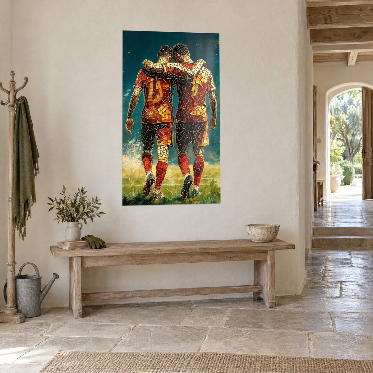 Tableau frères d'armes de dos en maillots rouges aux éclats ambrés, pelouse verte, sur un mur de pierre en trois-quarts