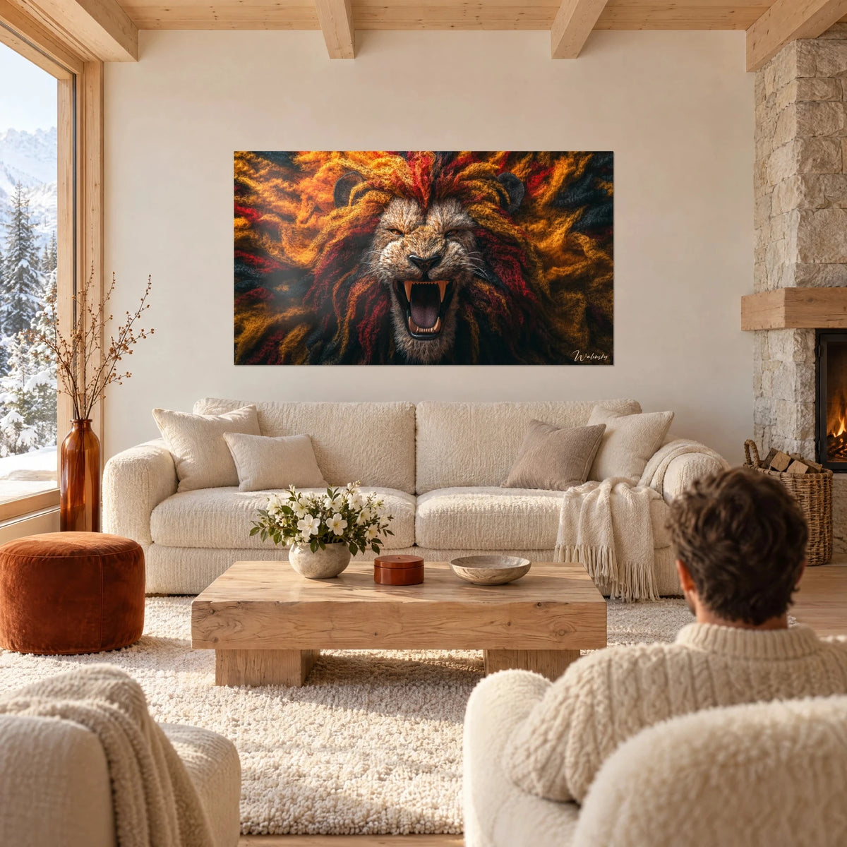 Wall art roaring lion with open jaws, mane of orange and red wool, a couple seen from behind above a sofa in a bright living room