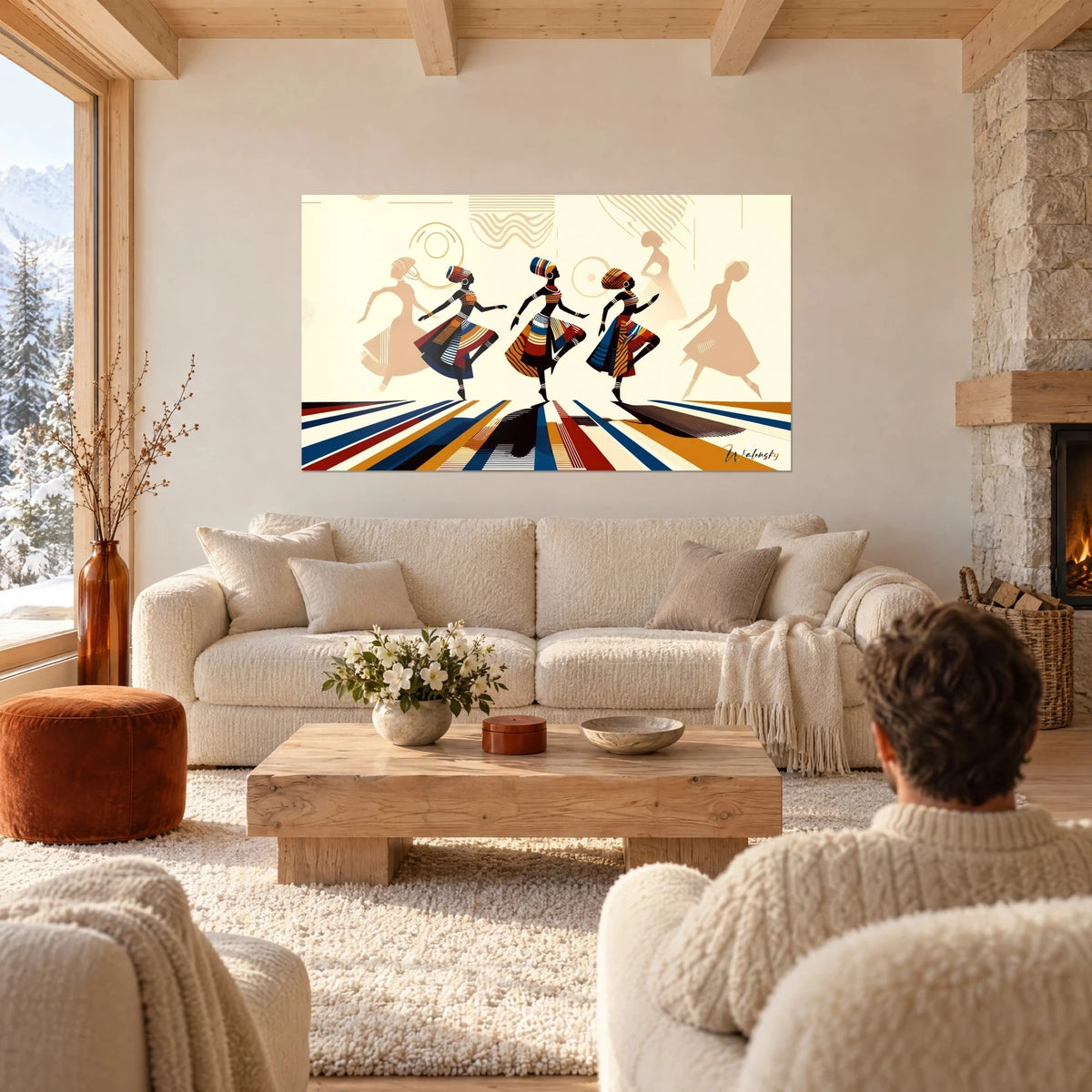 Wall art three African dancers in blue and ochre striped skirts on a cream background, above a sofa in a bright living room