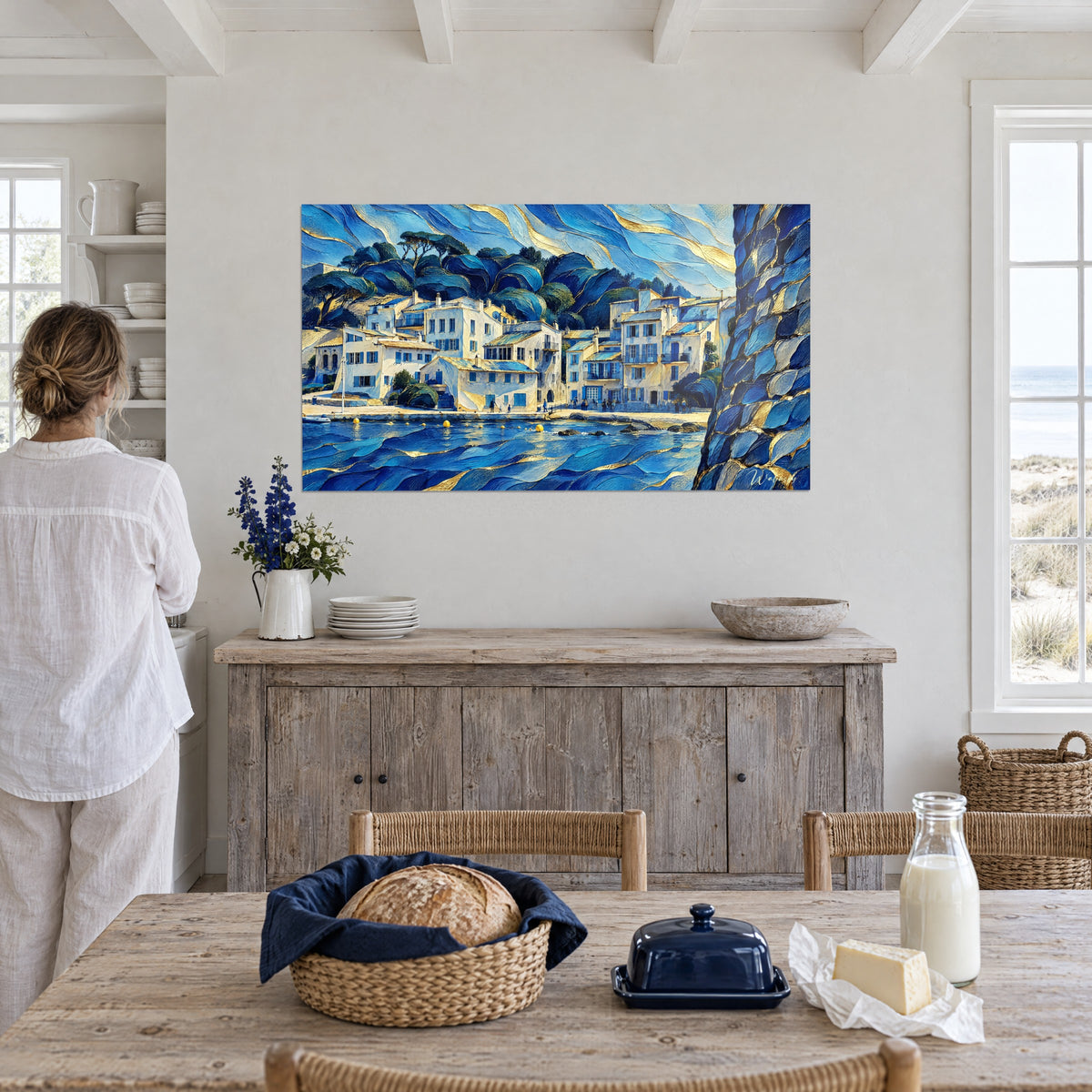 Schilderij Klein wit haventje met turquoise daken, indigoblauwe en gouden golven, tegenover de keukentafel van een strandhuis