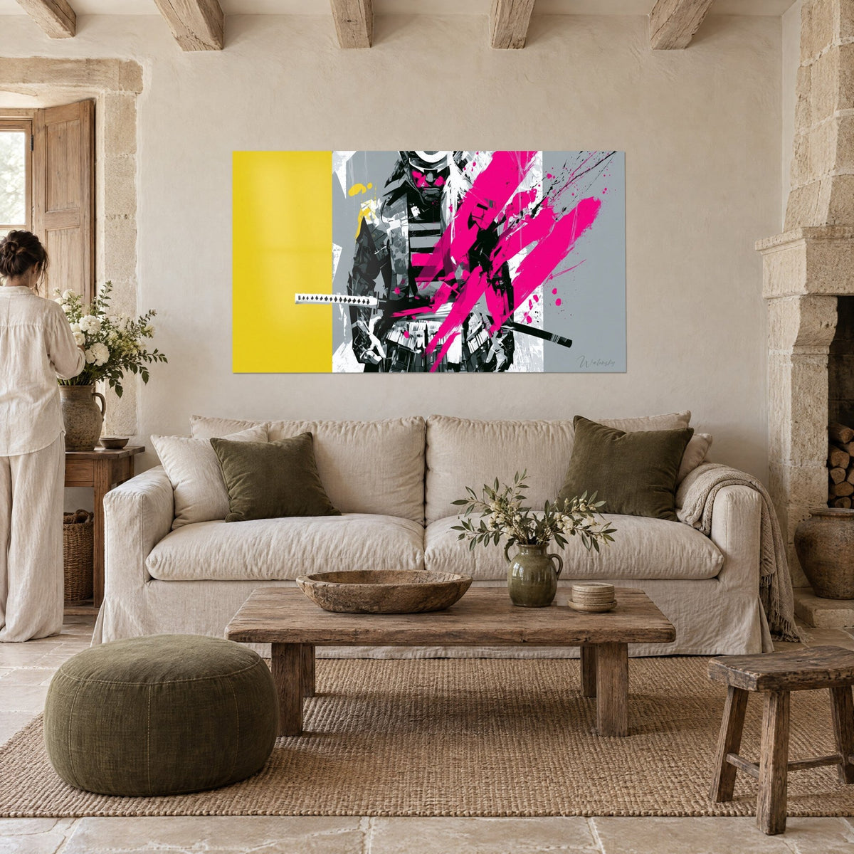 Wall art samurai in black armor, fuchsia pink splashes and lemon yellow stripe, hung in a stone living room above the sofa in a bright lounge