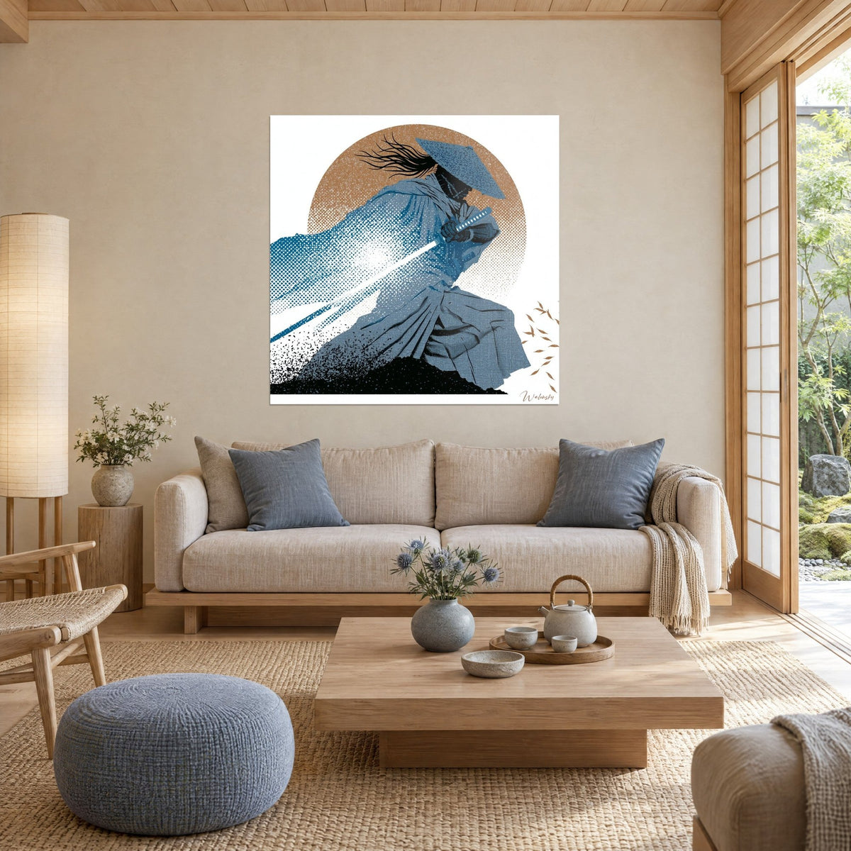 Wall art of a warrior in a conical hat, sword drawn, slate blue and ochre on a disc, above a sofa in a bright living room