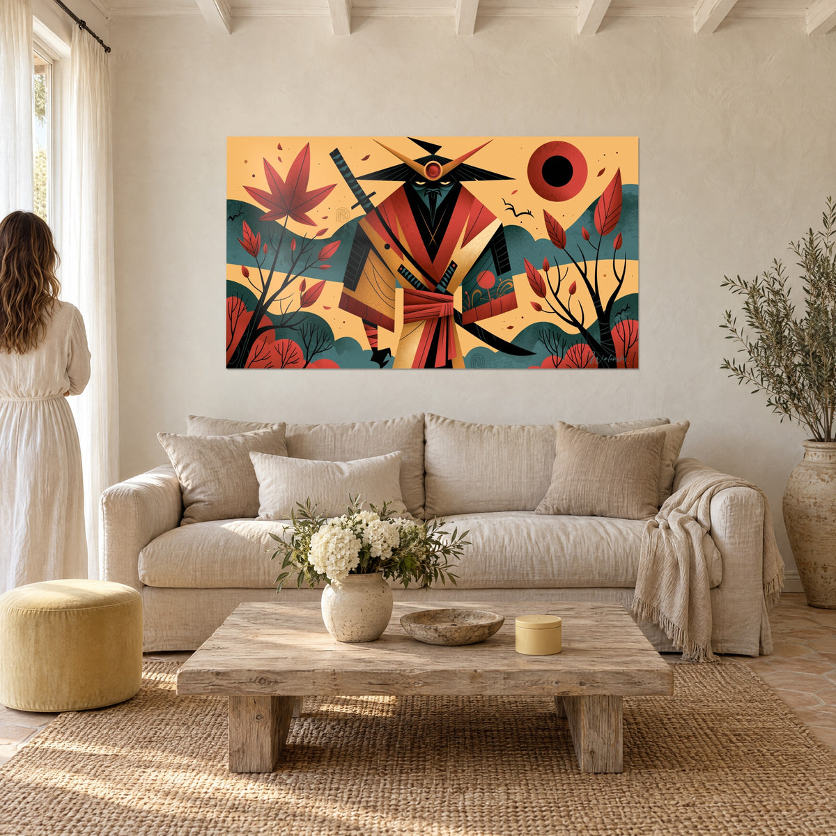 Wall art of a samurai in a red and ochre kimono beneath a scarlet maple, black sun, above a sofa in a bright living room