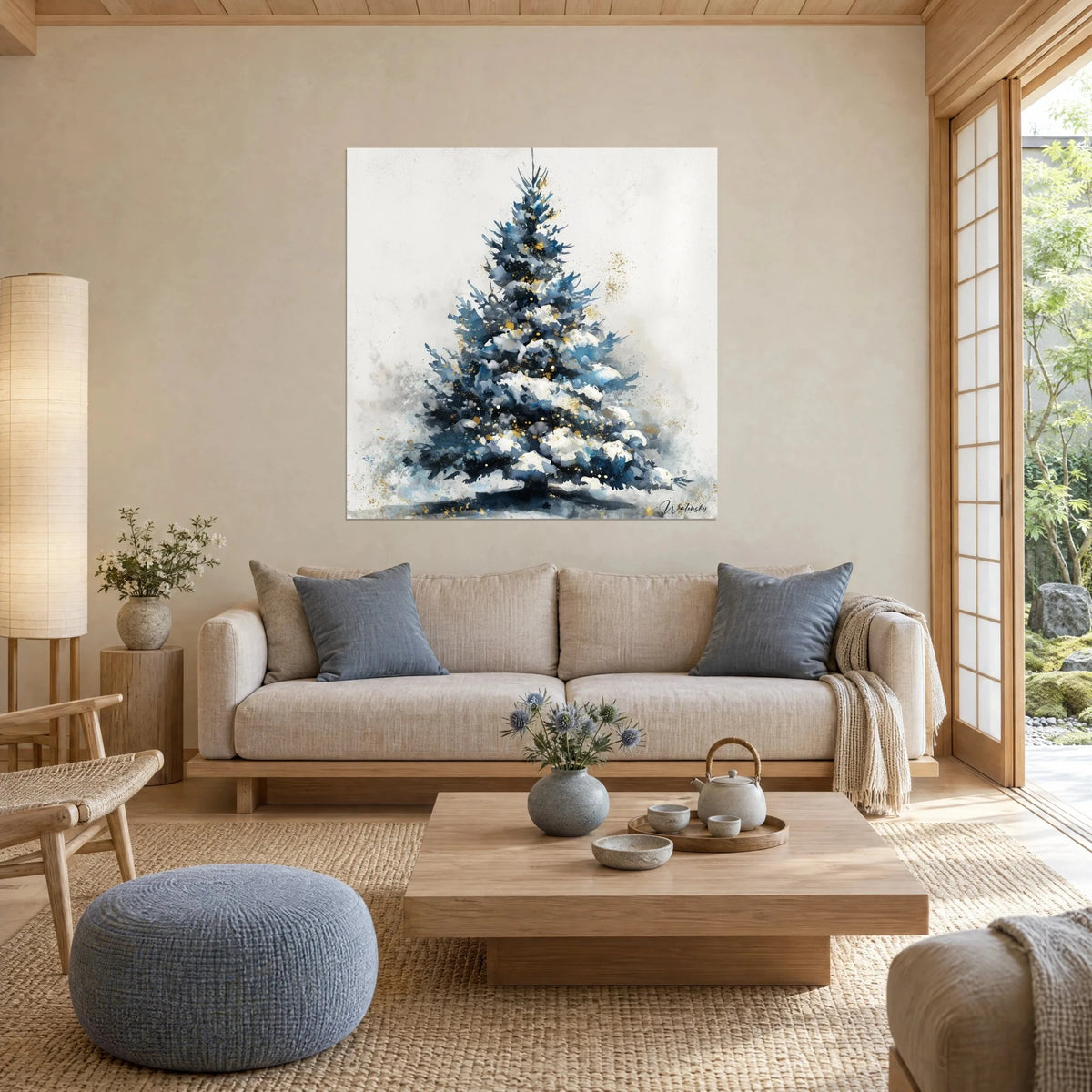 Wall art snowy fir tree with midnight blue branches dusted with gold glitter, ivory background, above a sofa in a bright living room