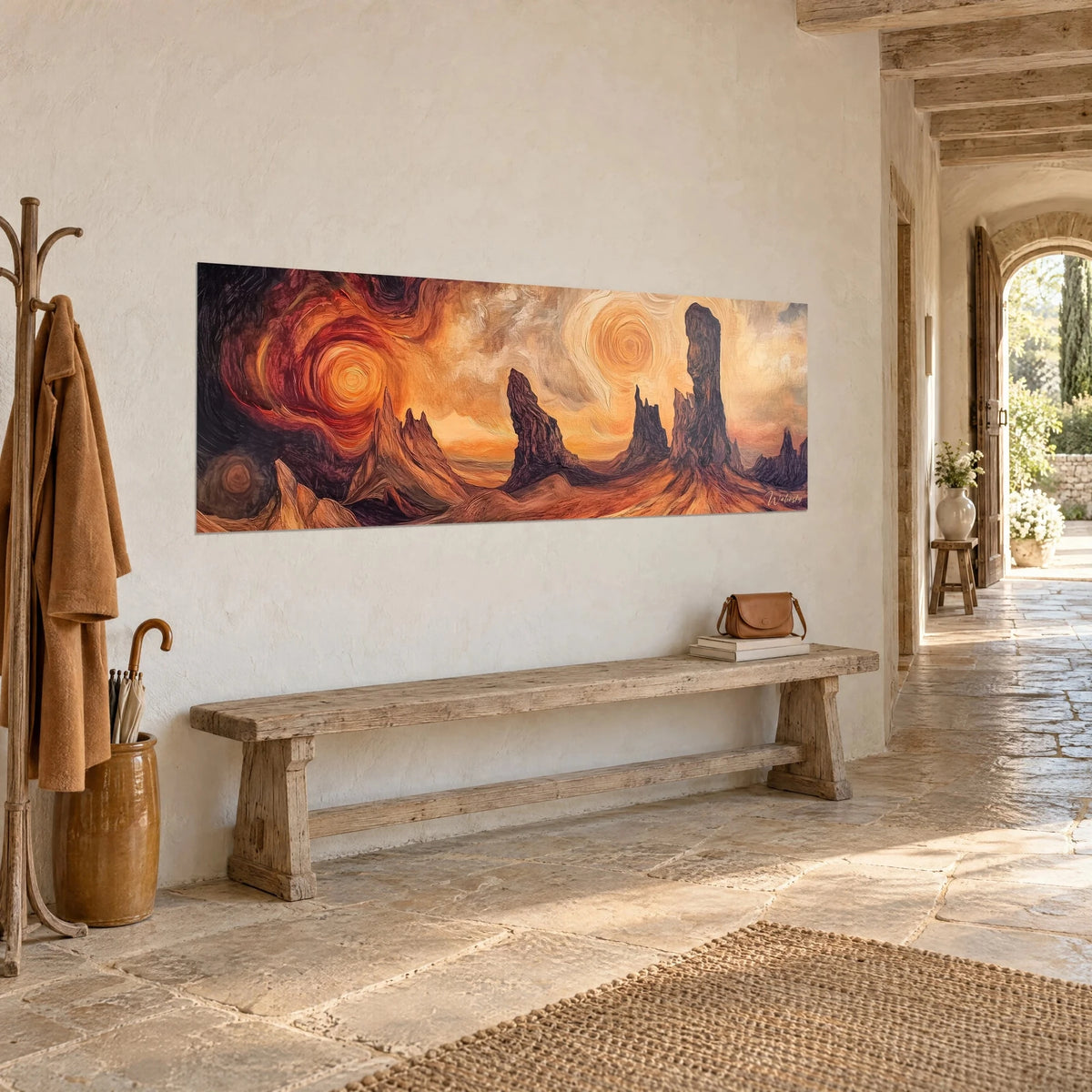 Wall art of a desert mirage with brown rock spires and a swirling ochre and carmine sky, stone hallway, rustic bench