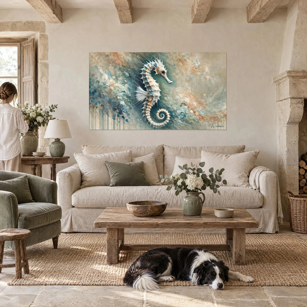 Wall art seahorse with pearly spines on turquoise and ochre background, two people and a collie, above a sofa in a bright living room