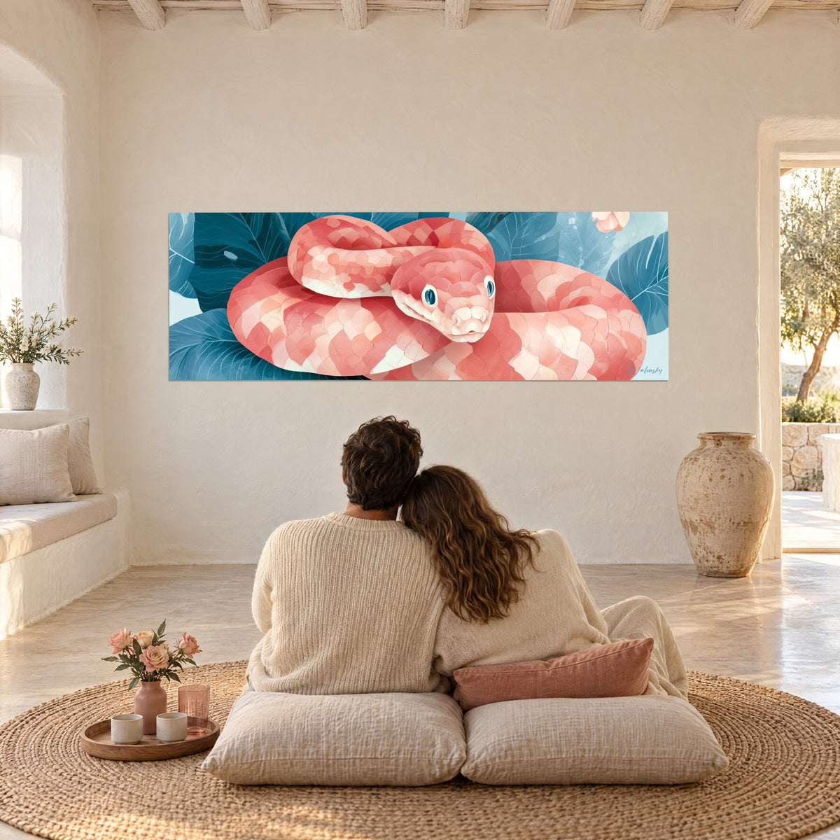 Wall art pastel snake with azure blue eyes, coral and cream spirals, teal-blue leaves, facing a couple seen from behind on linen cushions