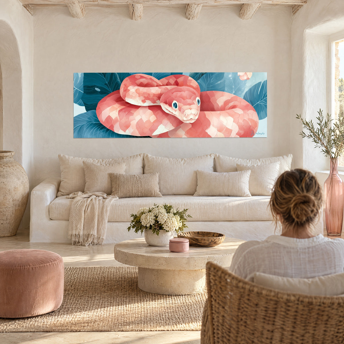 Wall art coral snake coiled on large petrol-blue leaves, salmon pink and cream scales, above a sofa in a bright living room
