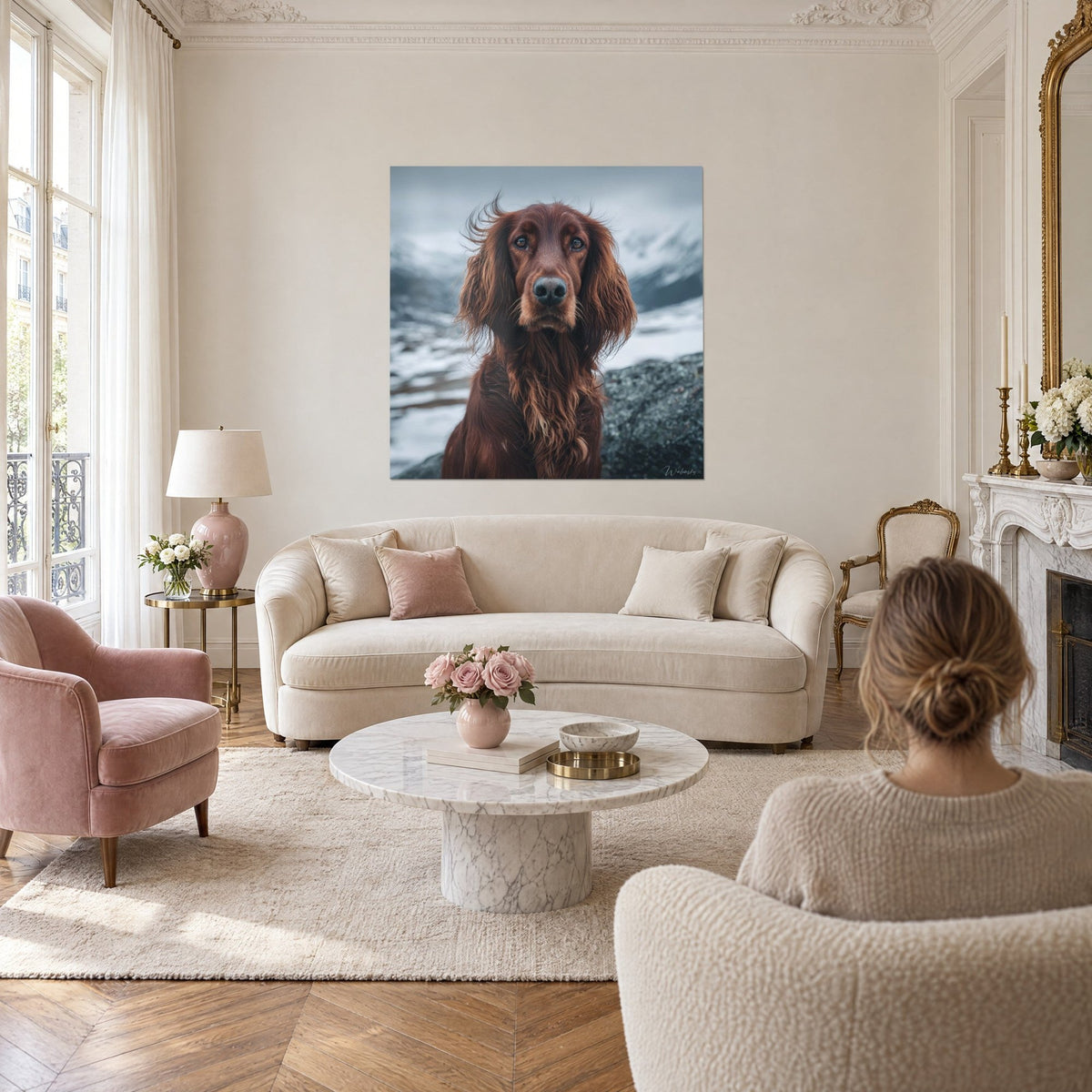 Wall art mahogany Irish Setter with fringed ears, grey sky and snow, a woman seen from behind above a sofa in a bright living room