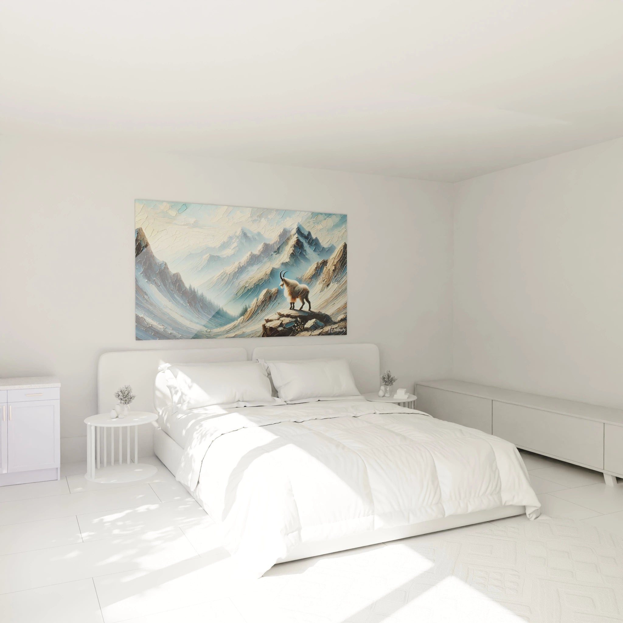 Dans une chambre, ce tableau Montagne embellit l'espace au-dessus du lit, apportant une ambiance apaisante et la majesté d'un bouquetin solitaire dans un paysage alpin.

