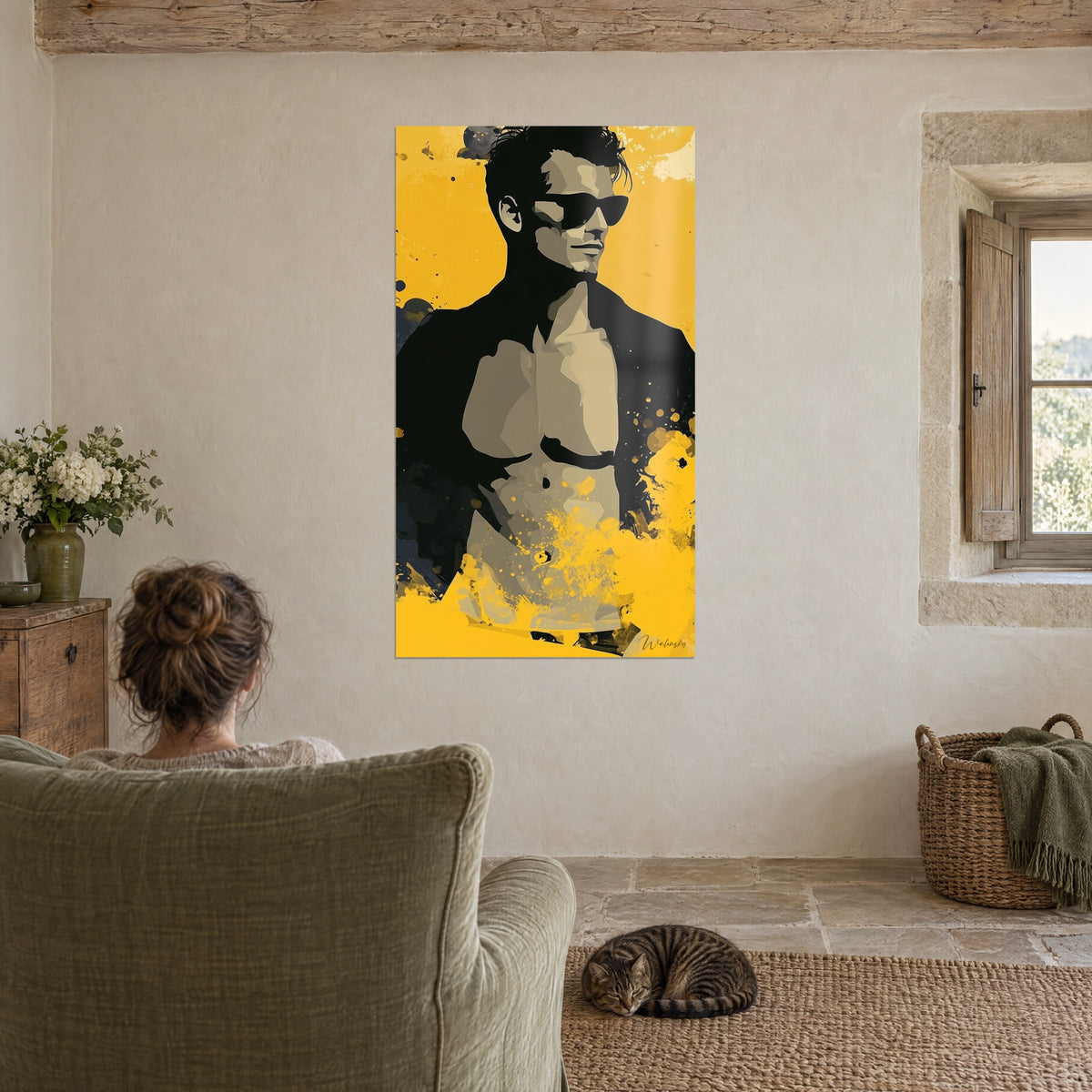 Wall art dandy shirtless, black sunglasses, sunshine yellow stains and deep black, one person seen from behind in a green armchair, sleeping tabby cat