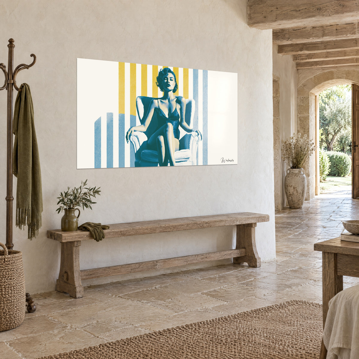Wall art female silhouette leaning on one elbow, legs crossed, mustard and sky blue stripes, on a stone wall beside a wooden bench