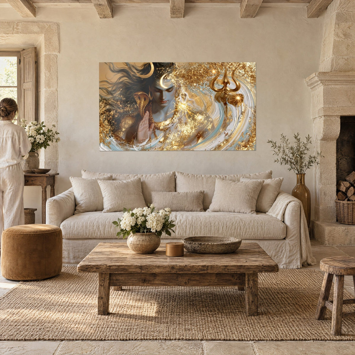 Wall art Shiva with closed eyelids, golden cobra and sparkling trident over a white and turquoise swirl, above a sofa in a bright living room