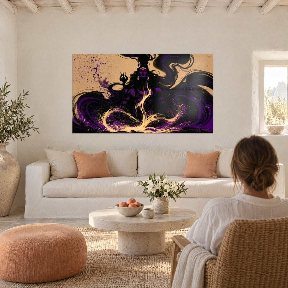 Wall art Shiva deity with violet features, golden crescent on the forehead, swirling black and gold ink, above a sofa in a bright living room