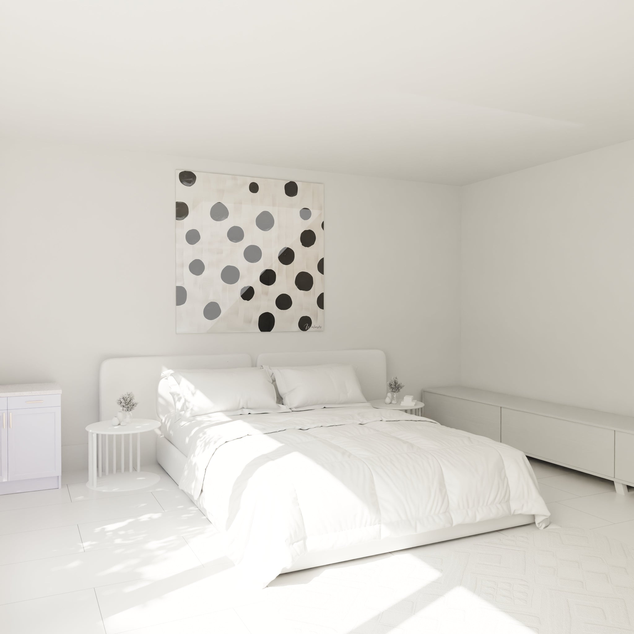 Tableau tacheté noir et blanc de Walensky accroché au mur dans une chambre lumineuse