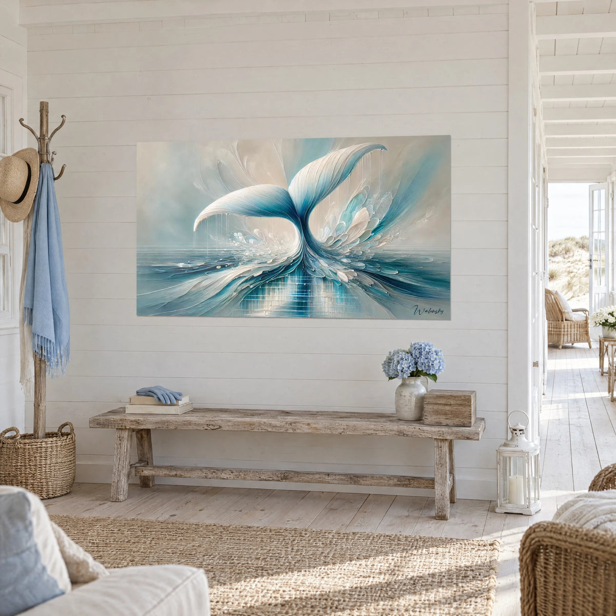 Wall art mother-of-pearl whale fin with turquoise and cream feathers, three-quarter view, in a seaside home