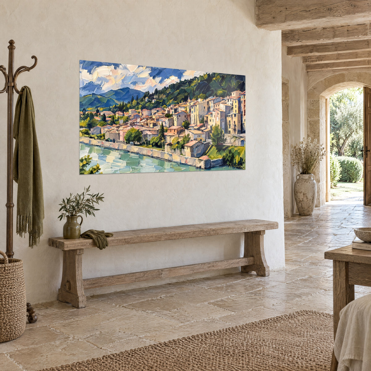 Cuadro Casas de piedra dorada apiladas, río verde agua y colina boscosa, colgado sobre un banco de madera
