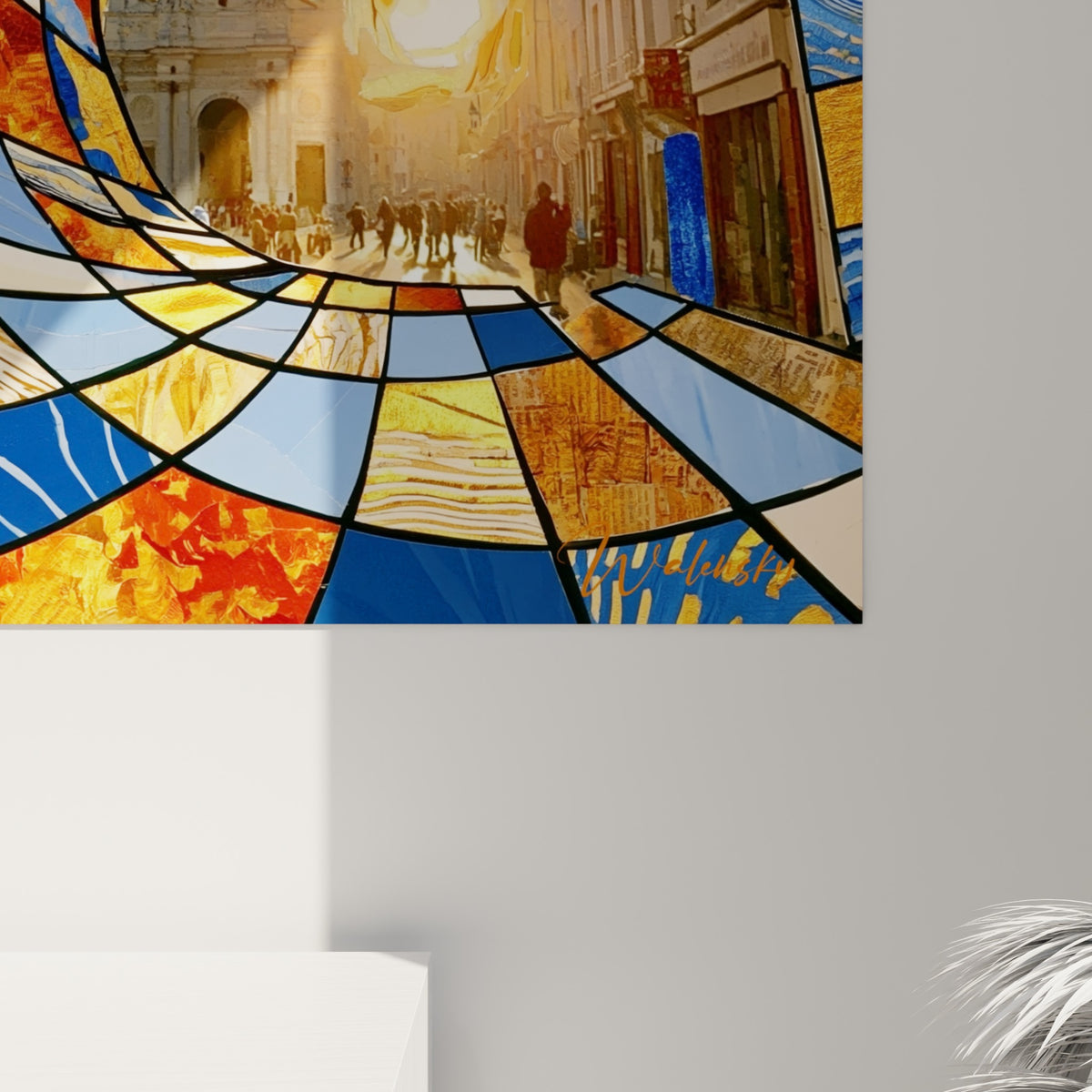 Empâtements dorés et bleus se mêlant en spirale sur la toile skateboard accrochée au mur