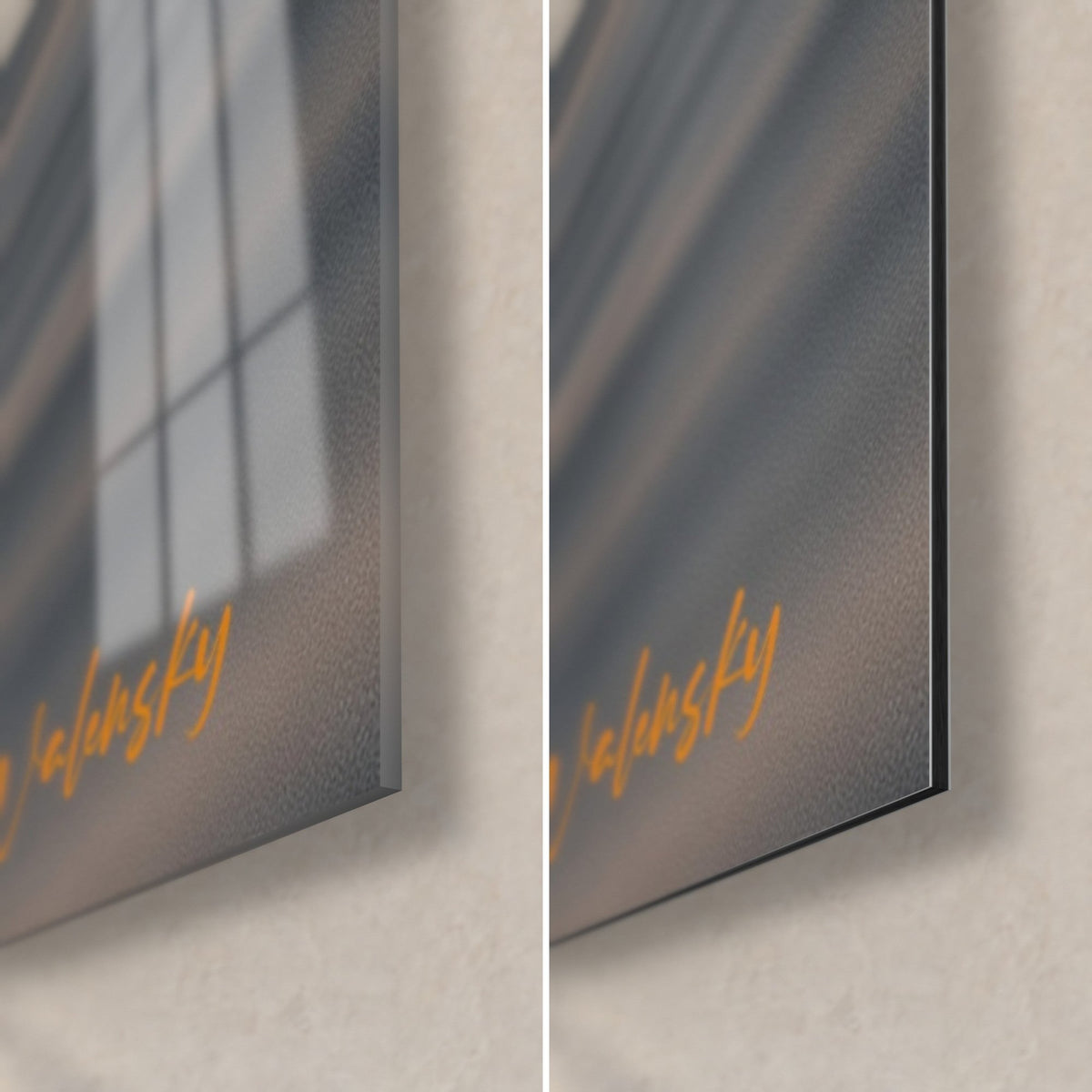 Wall art rider in black jacket, bottom right corner: glossy acrylic glass with reflections and matte grey Dibond aluminum, 3 mm edge, orange signature