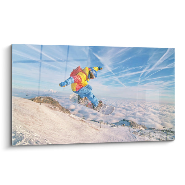 Tableau Snowboardeur combinaison jaune et bleue au-dessus des nuages - Envol au sommet - Edition Snowboard