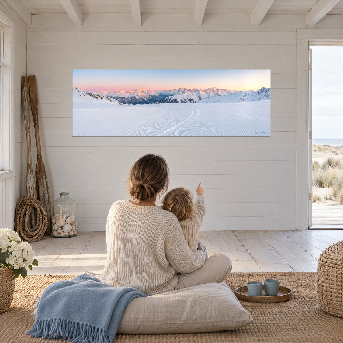 Wall art snowboard track on a rolling slope, salmon-pink peaks and azure snow, admired by a mother and her child in the living room