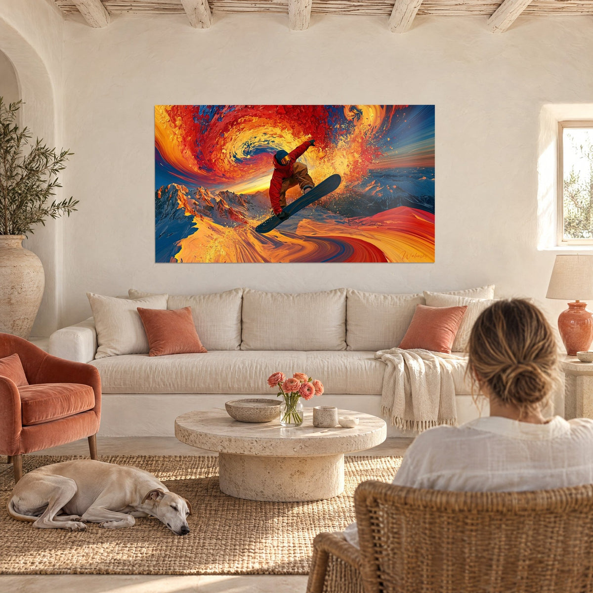 Tableau snowboardeur en combinaison rouge sautant dans un tourbillon orange et jaune, femme de dos, greyhound, au-dessus d'un canapé dans un salon lumineux