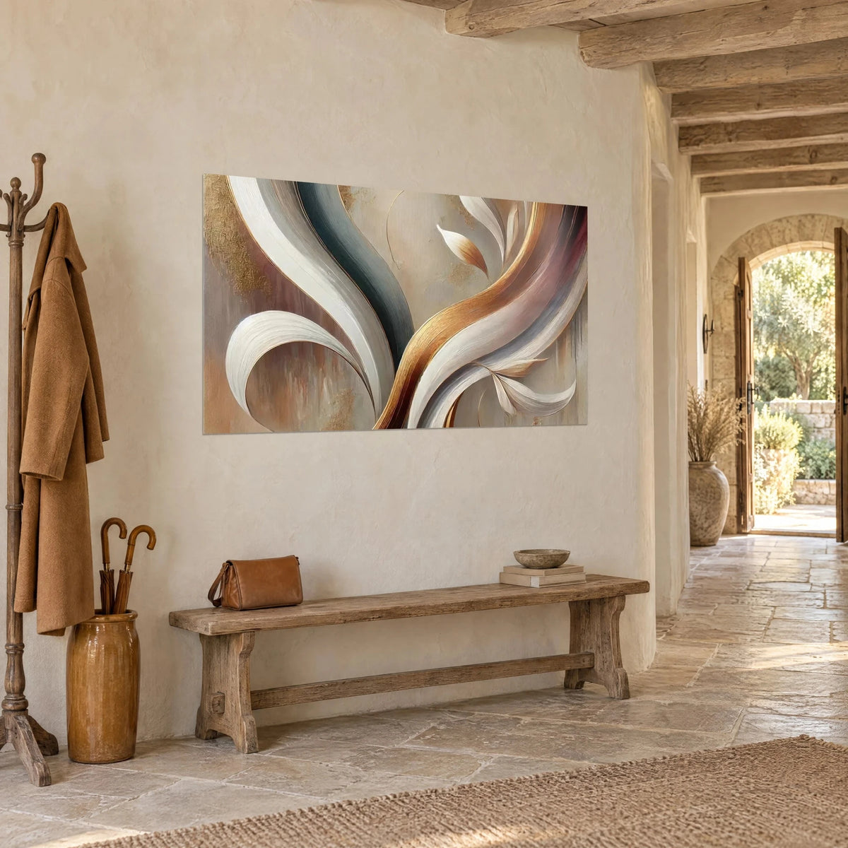 Wall art with golden and grey-blue spiral volutes, three-quarter view, hung in an entrance with ochre stone walls