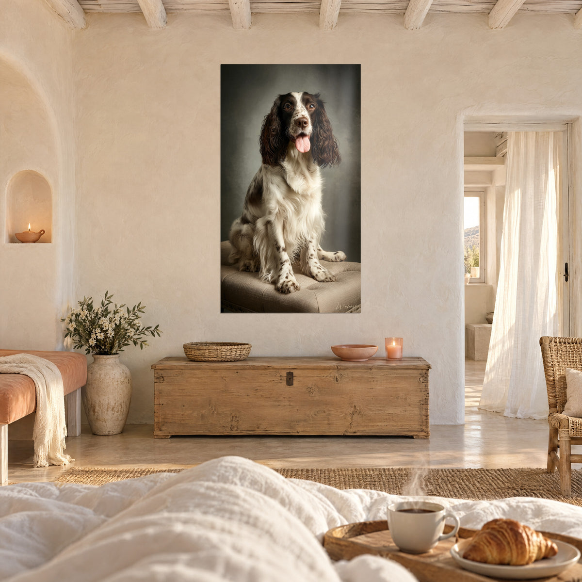 Wall art seated spaniel, chocolate muzzle flecked with white, hazel eyes, sand-coloured tufted pouf above a bed in a light bedroom