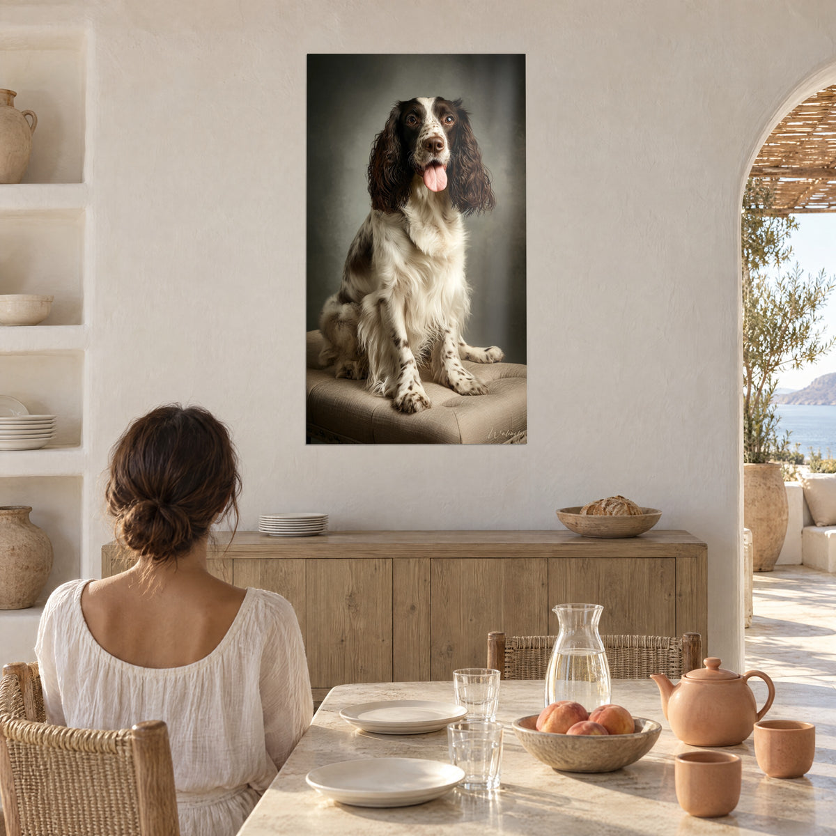 Wall art English springer with an ivory coat flecked with brown, misty grey background, facing a woman seen from behind in the dining room