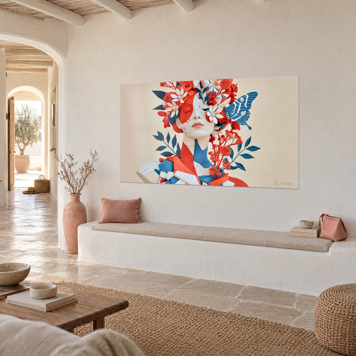 Tableau visage de femme aux paupières closes sous une couronne de lys blancs et rouges, mur crème et banquette blanche
