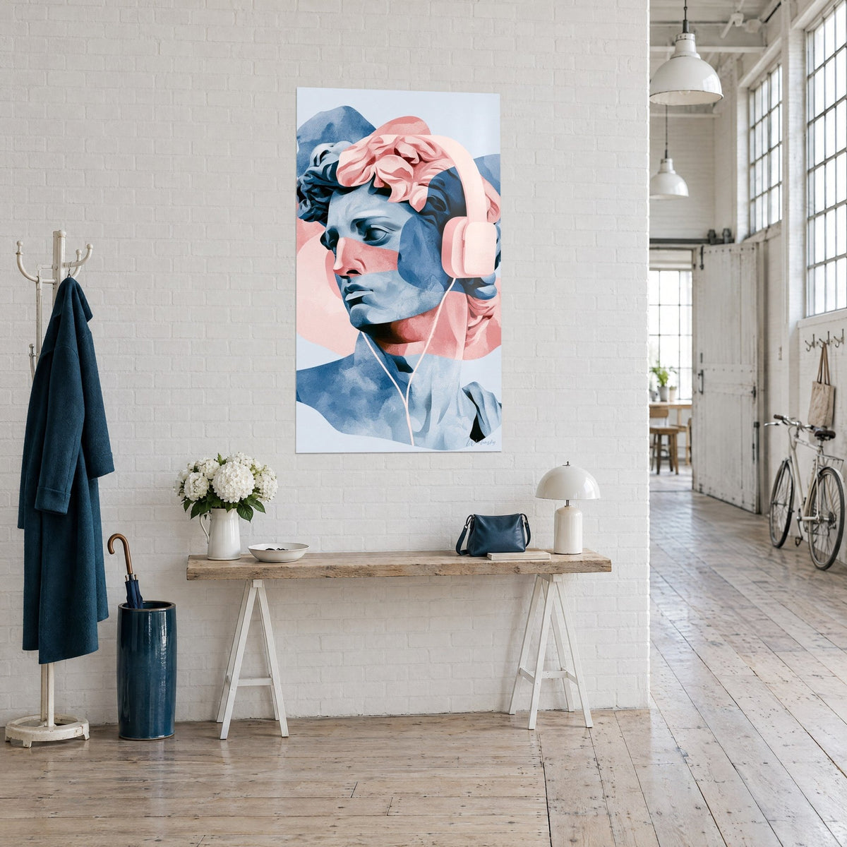 Cuadro de estatua griega con rizos rosas y rostro azul pizarra, cable blanco de los auriculares, consola de madera, loft de artista