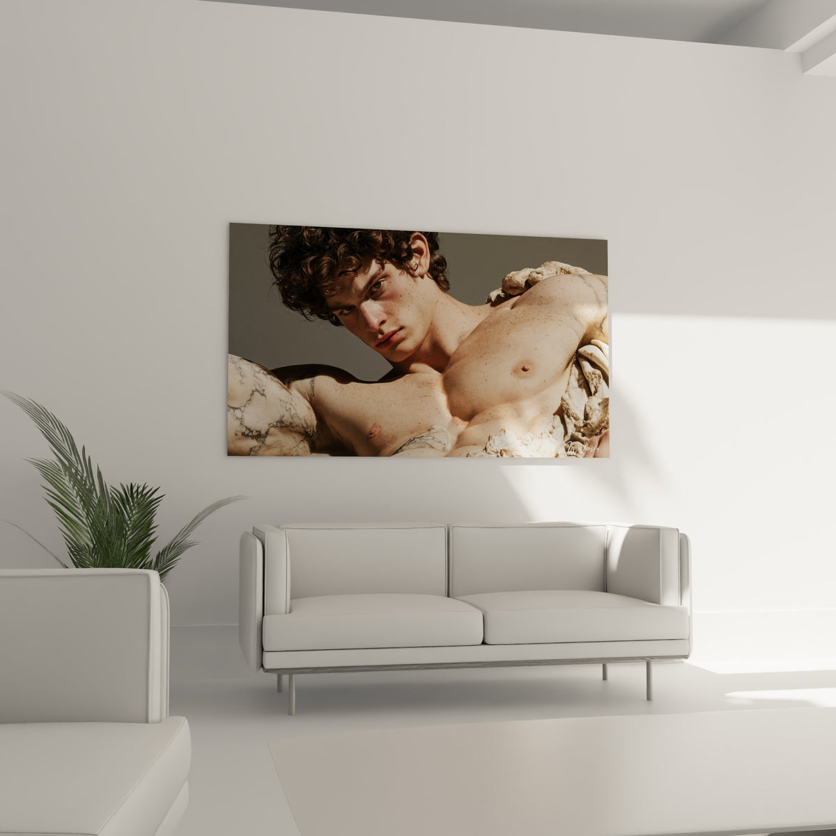 Buste marbré beige et anthracite de cette Statue, au-dessus d'un canapé dans un salon lumineux