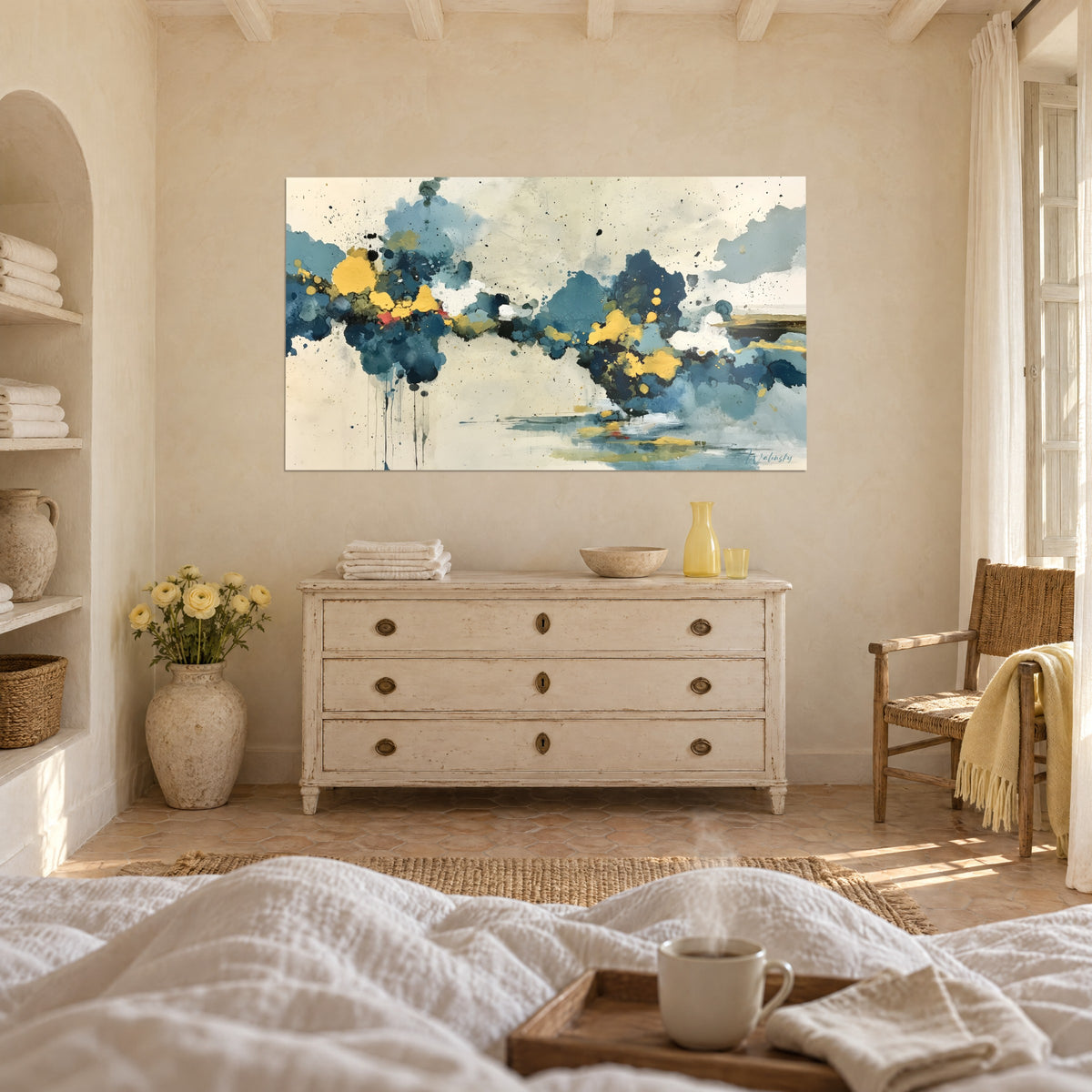 Wall art of indigo cloud masses and touches of golden yellow on ivory background, hung above a bed in a light bedroom